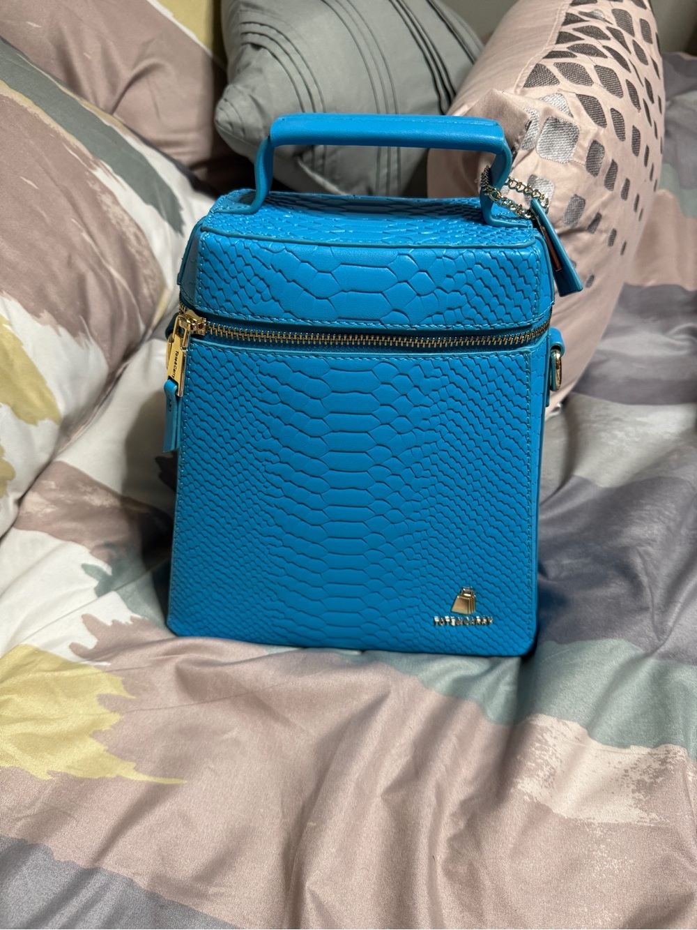 Tote n carry cowbell Bright Blue Textured Top-Handle Vanity Bag